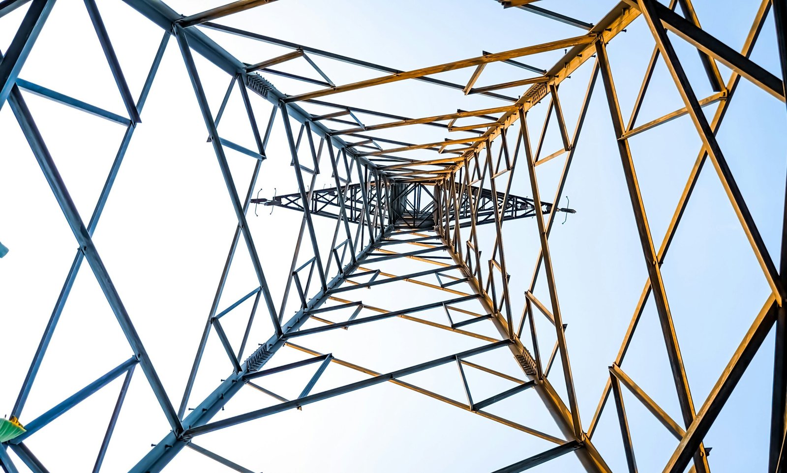 a tall metal structure with a sky in the background